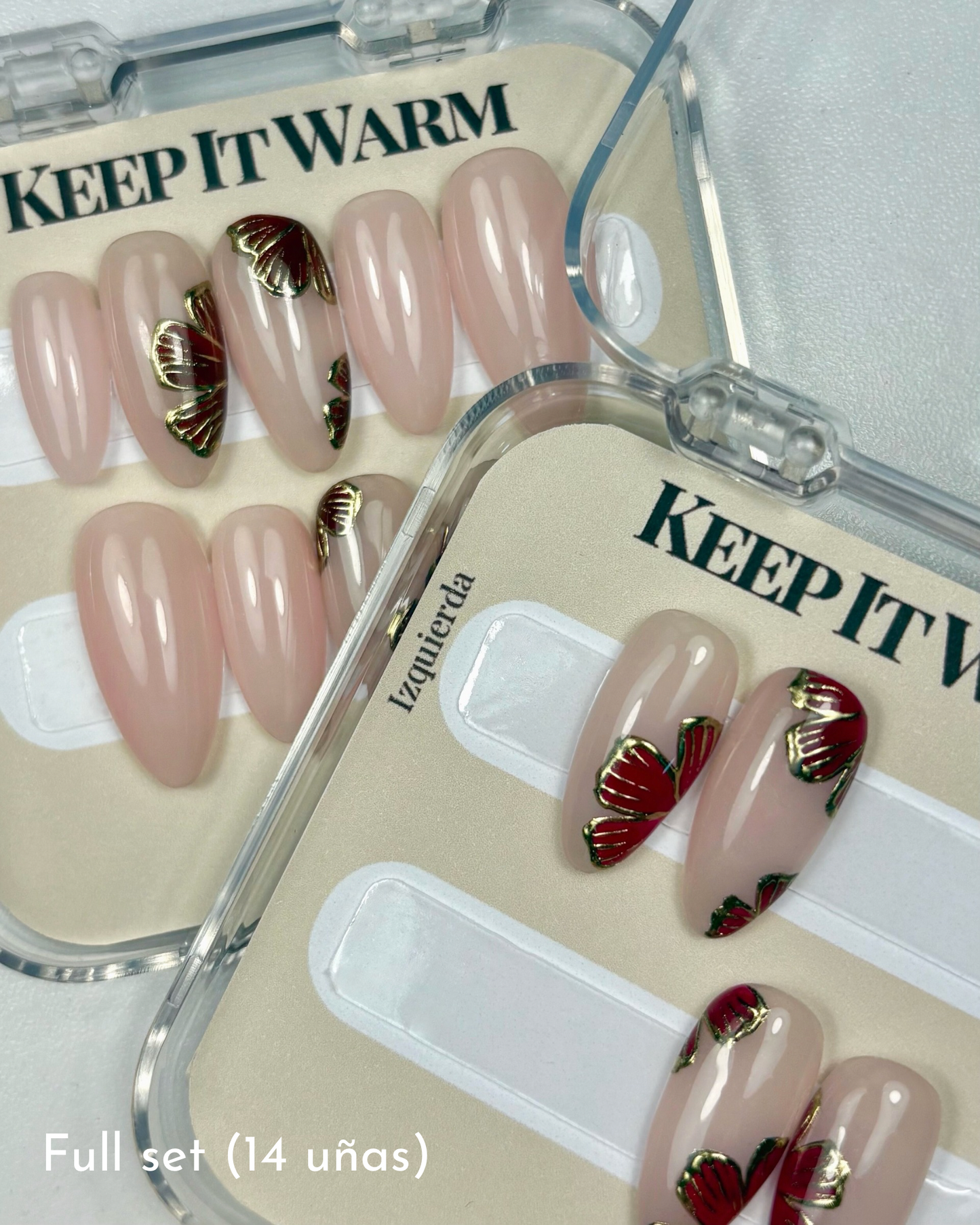set de 14 uñas press-on nudes con flores combinables en colo marrón y vino y contorno dorado cromático en su caja de presentación colección keep it warm