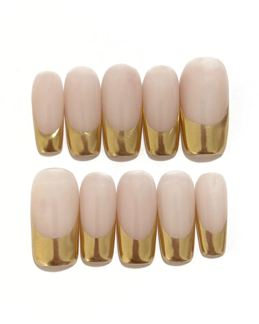 set de uñas press-on nudes con francesa cromática dorada