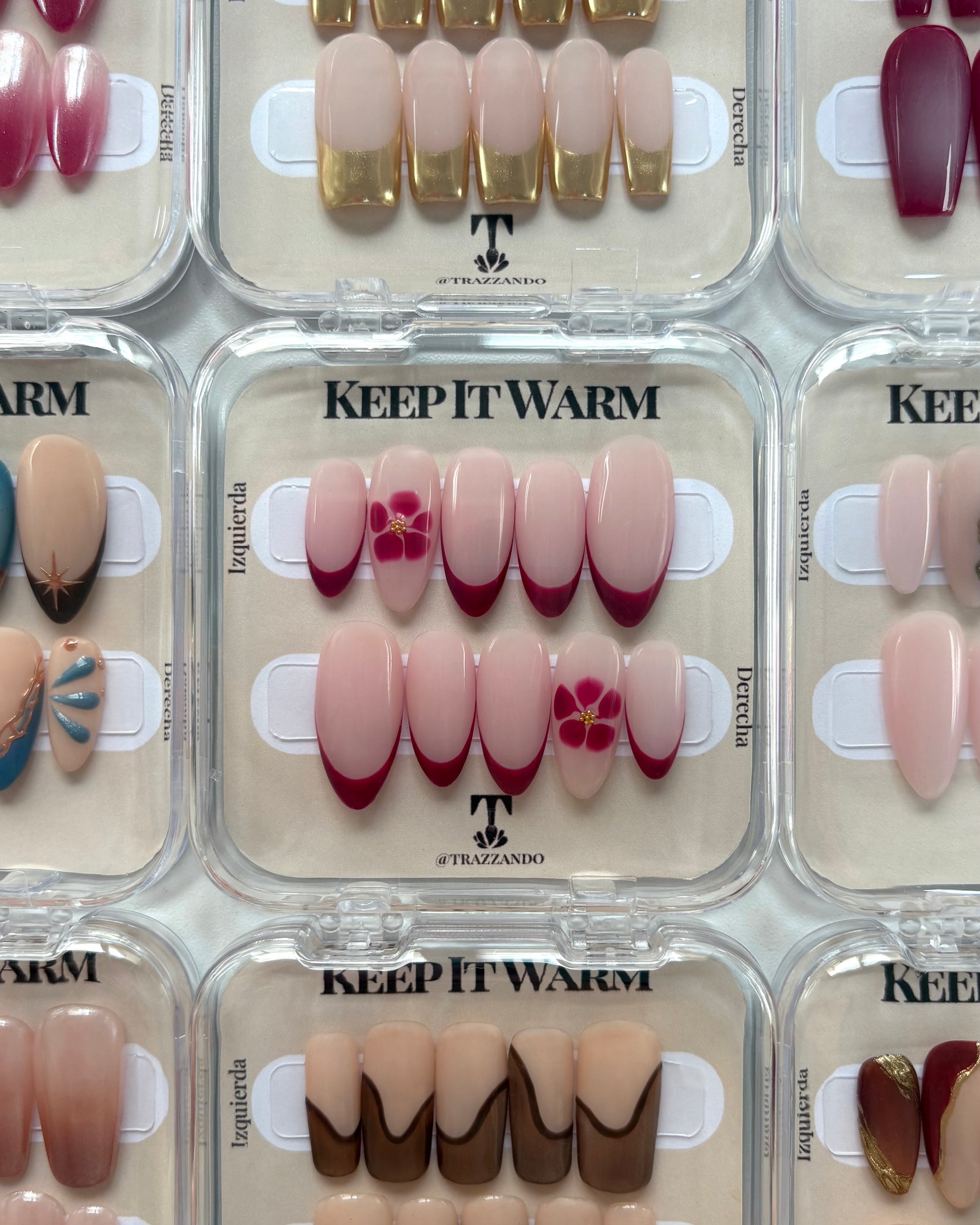 set de uñas press-on nudes con francesa burdeos y flor blooming con caviar dorado en su caja original colección keep it warm