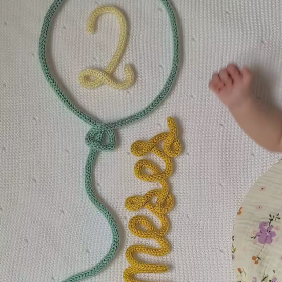 video de presentación del artículo figura decorativa en lana globo 12 meses